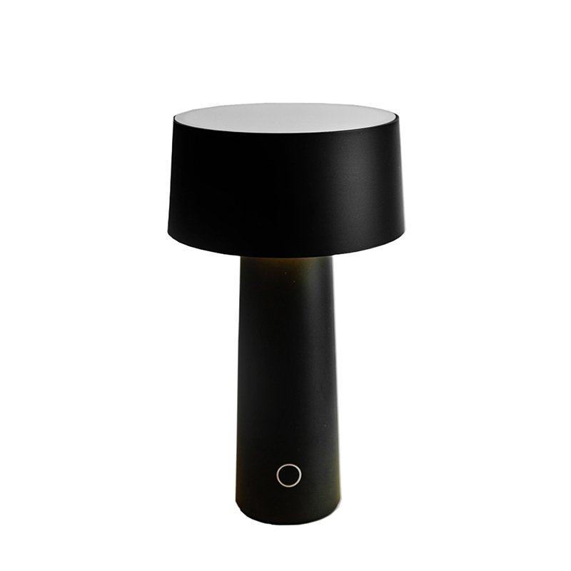 Vesta, Mush black lamp with rechargeable wireless base, designers Ludovica and Roberto Palomba