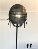 Paolo Fiorellini, maschera "Pesce", Ecce Homo, alluminio e tela di iuta, 30x180