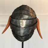 Paolo Fiorellini, maschera "Ariete", Ecce Homo, alluminio, legno e tela di iuta, 30x180