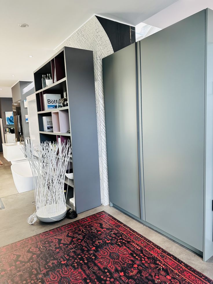 Valdesign, cucina Logica L0 con colonna attrezzata e top in acciaio