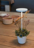 Zafferano, lampada tavolo Poldina Reverso bianca con base ricarica wireless