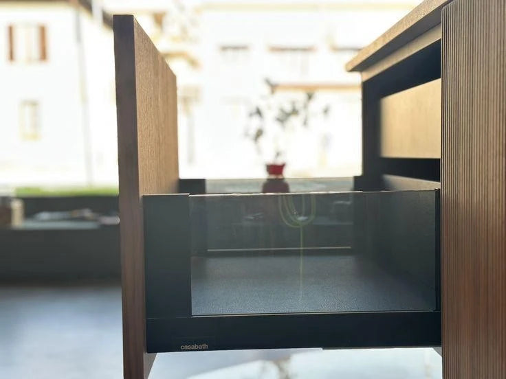 Casabath, mobile lavabo XS dogato noce walnut, top marmo cresma di luna e lavabo in appoggio in Monolith