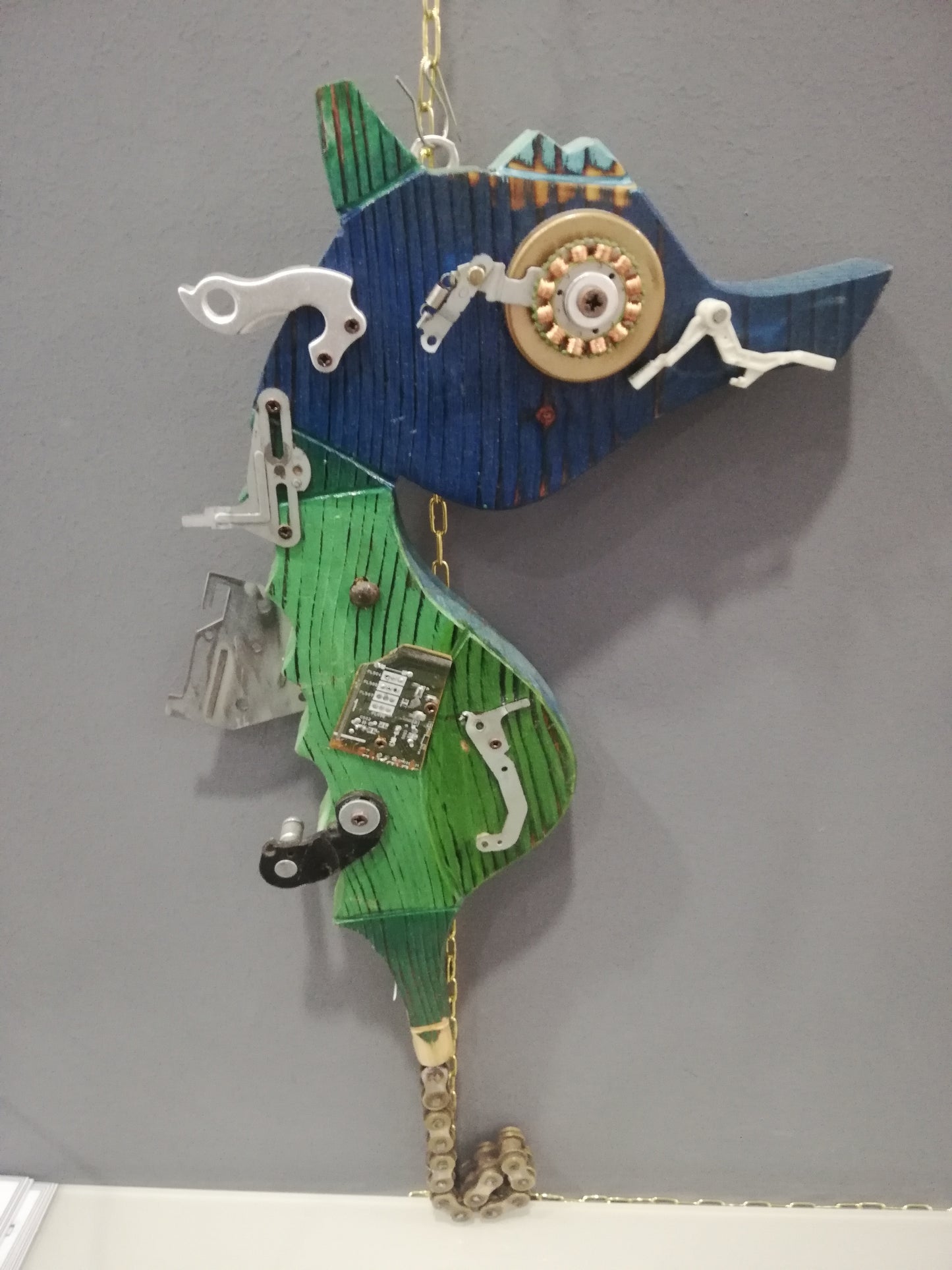 Artestò, Seahorse Blue head chain, wood and scrap mechanical parts, 40x25x5 cm